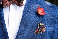 Red Christmas Rose Boutonnière Flower